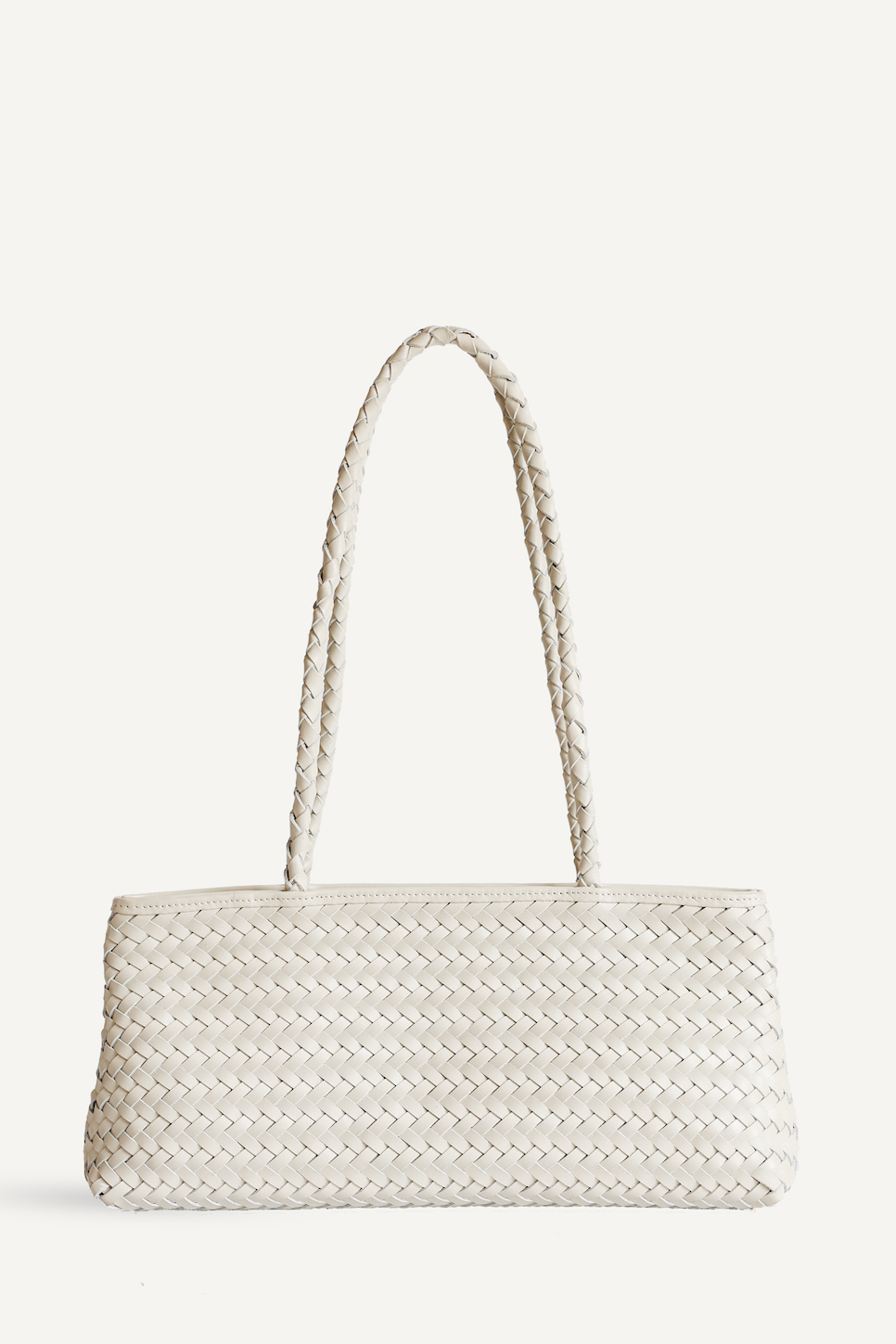 Woven handbag on a light beige background