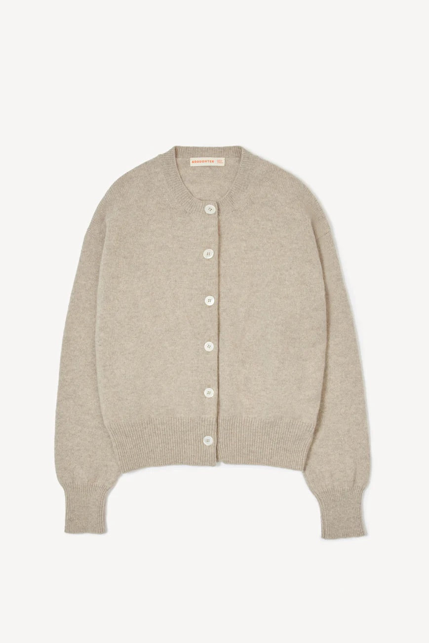 Beige cardigan on a white background