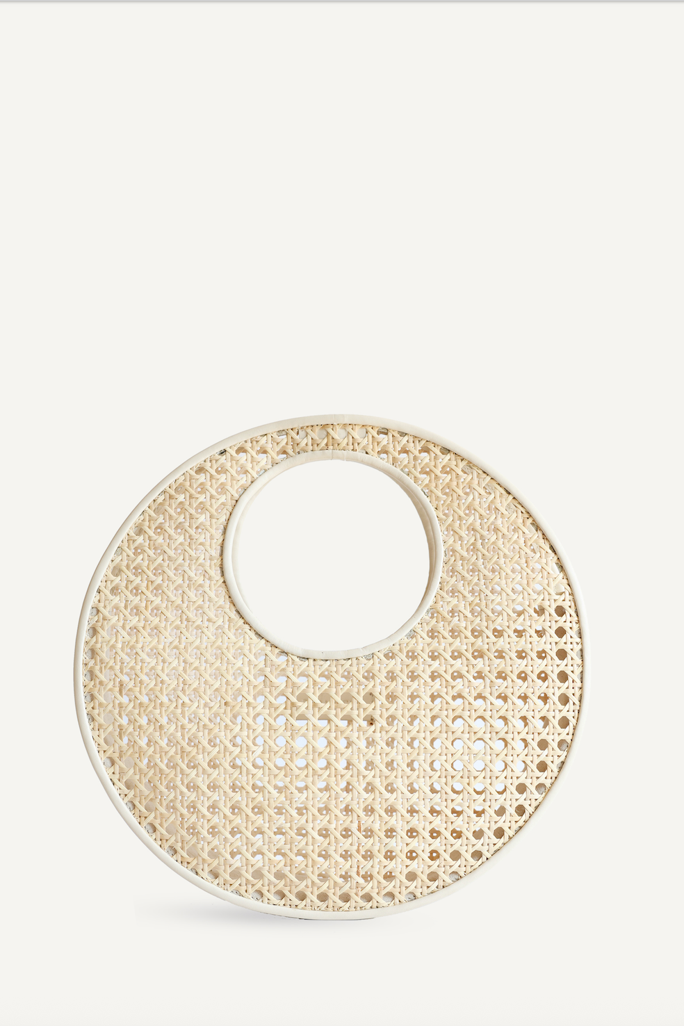 Round woven placemat on a white background
